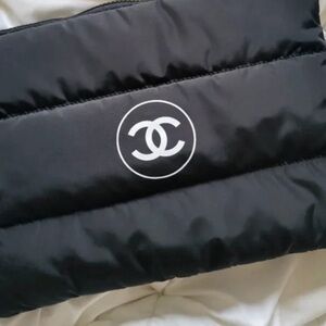Chanel black puffy Logo zip Clutch sealed. New! Large size.